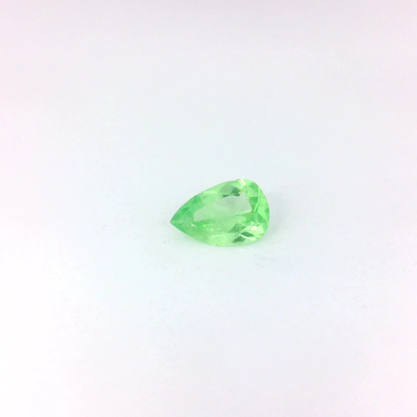 0.40ct Pear Natural Garnet (Colour Green, Clarity Slightly Included, Cut Faceted)